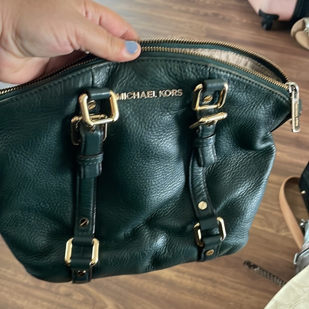 Michael Kors leather hunter green color. Great condition.